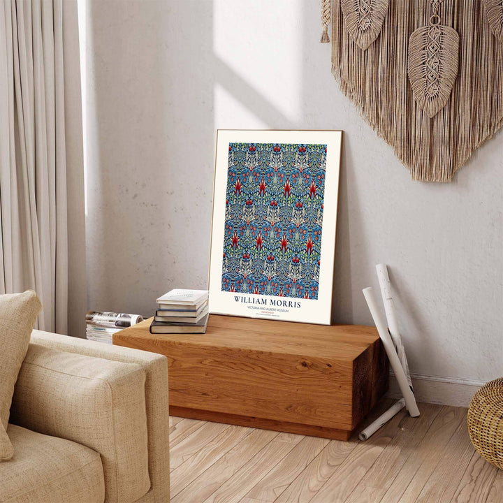 Deep indigo tones meet flame red petals in a sophisticated William Morris Snakeshead artwork print. MapYourDreams provides stylish framed, unframed, and canvas options available for designing dramatic living quarters.