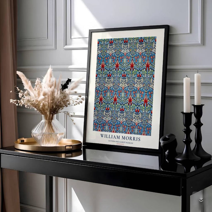 Deep blue backgrounds highlight red fritillaria blossoms in this 1876 William Morris Snakeshead poster. Discover high-quality framed, unframed, and canvas options available at MapYourDreams to style your home gallery wall.