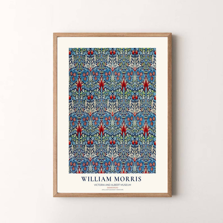 A regal indigo and red colorway transforms this classic 1876 William Morris Snakeshead design for home spaces. Explore fine framed, unframed, and canvas options available at MapYourDreams for lasting wall beauty.