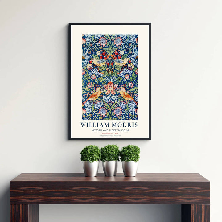 Rich navy blue and bright red fruit combine in this timeless English William Morris Strawberry Thief print layout. Choose tailored framed, unframed, and canvas options available at MapYourDreams to complement wooden furniture.
