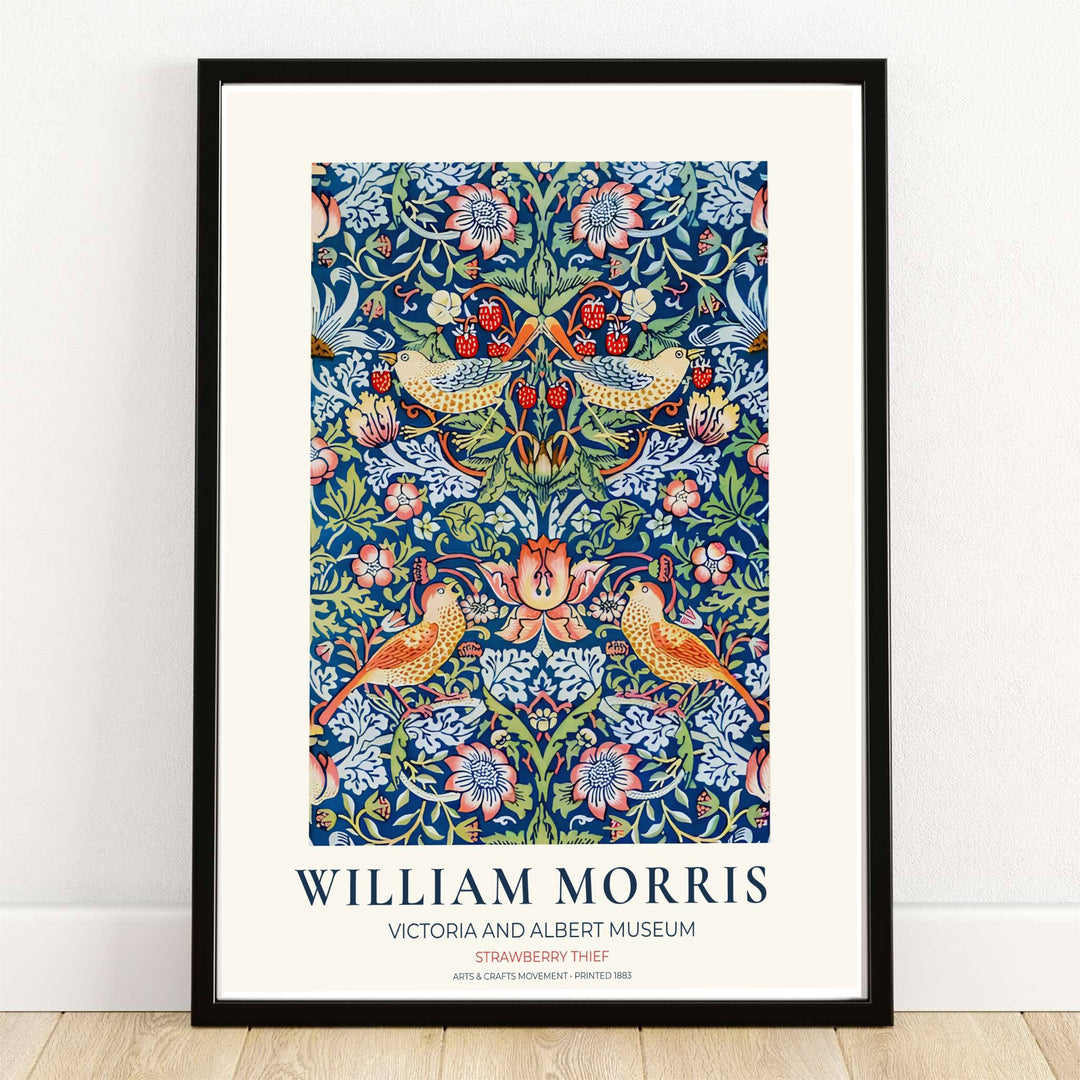 Thrushes steal ripe red strawberries on cobalt blue in this William Morris Strawberry Thief print. MapYourDreams supplies this vintage bird artwork in framed, unframed, and canvas options available for dining room wall decor.