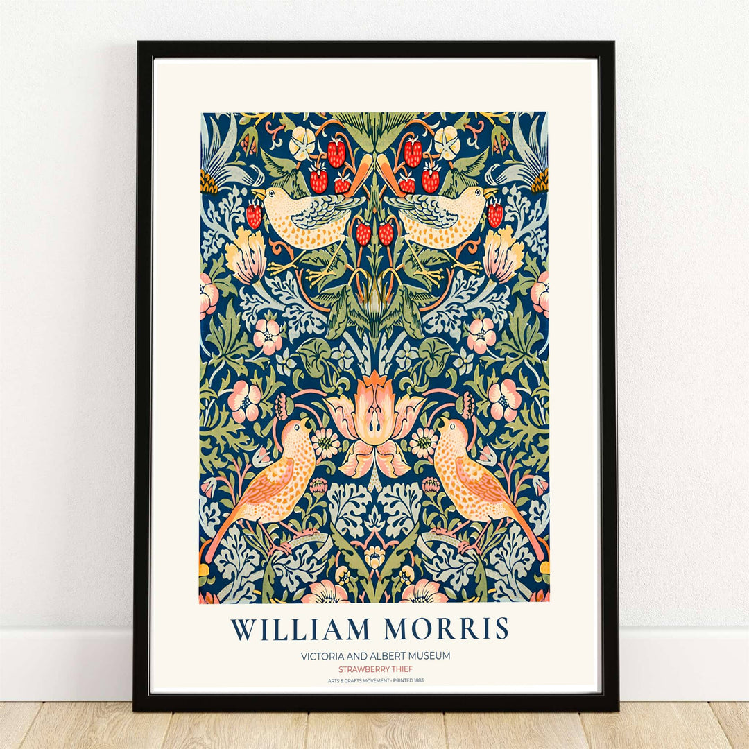 Victoria and Albert Museum exhibition print of William Morris Strawberry Thief with thrush birds and red berries on blue. MapYourDreams offers this artwork in framed, unframed, and canvas options available for gallery wall displays.