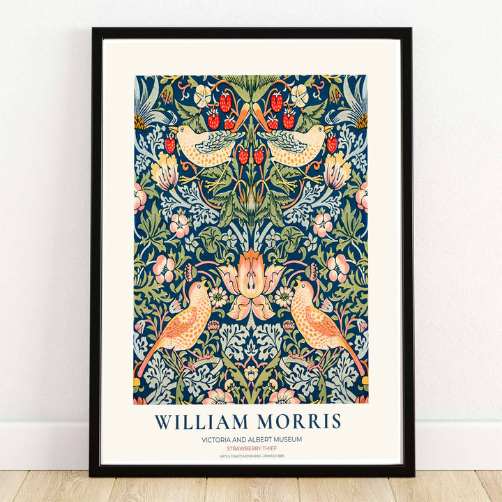 Victoria and Albert Museum exhibition print of William Morris Strawberry Thief with thrush birds and red berries on blue. MapYourDreams offers this artwork in framed, unframed, and canvas options available for gallery wall displays.