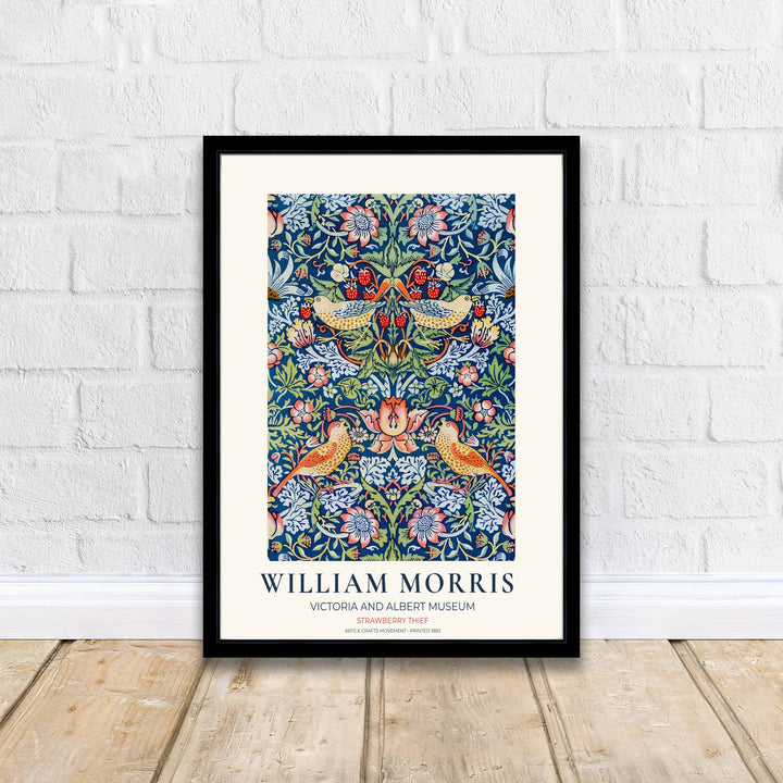 Garden thrush bird illustrations and red fruit define this William Morris Strawberry Thief print. MapYourDreams offers fine art framed, unframed, and canvas options available to elevate breakfast nook gallery wall setups.