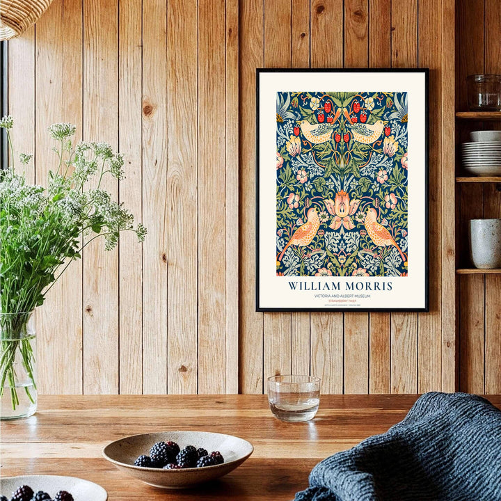 Victoria and Albert Museum text margin frames red fruit and yellow birds in a William Morris Strawberry Thief print. Discover ready-to-hang framed, unframed, and canvas options available at MapYourDreams for home styling.