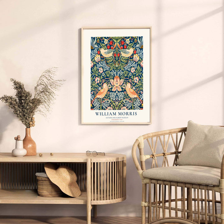 Authentic museum margin encloses thrush birds and green vines in this William Morris Strawberry Thief wall print. Buy long-lasting framed, unframed, and canvas options available at MapYourDreams for gallery wall collections.