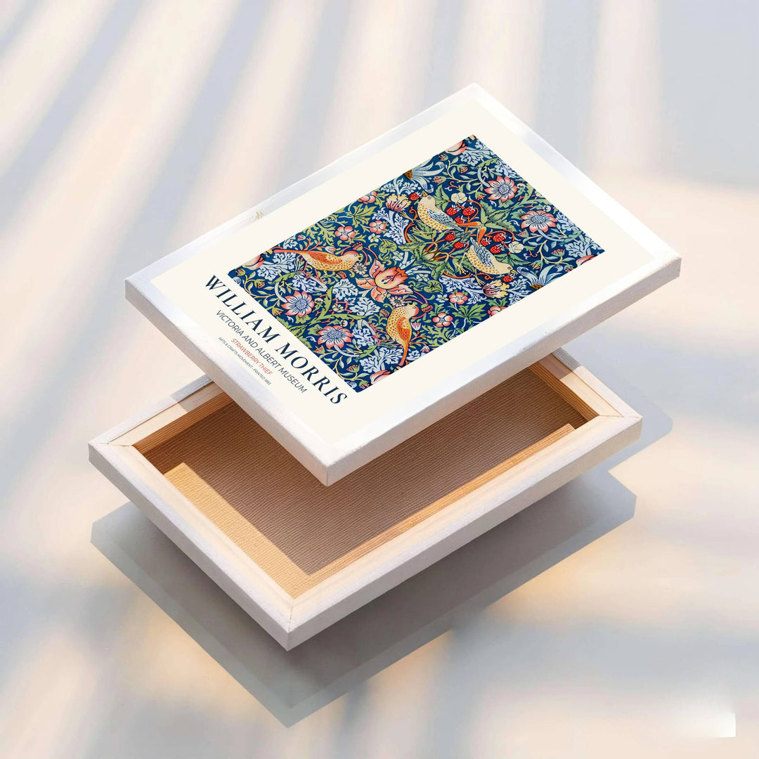 Storytelling bird motifs and green vines create a warm aesthetic in this William Morris Strawberry Thief art print. MapYourDreams features high-resolution framed, unframed, and canvas options available for kitchen walls.