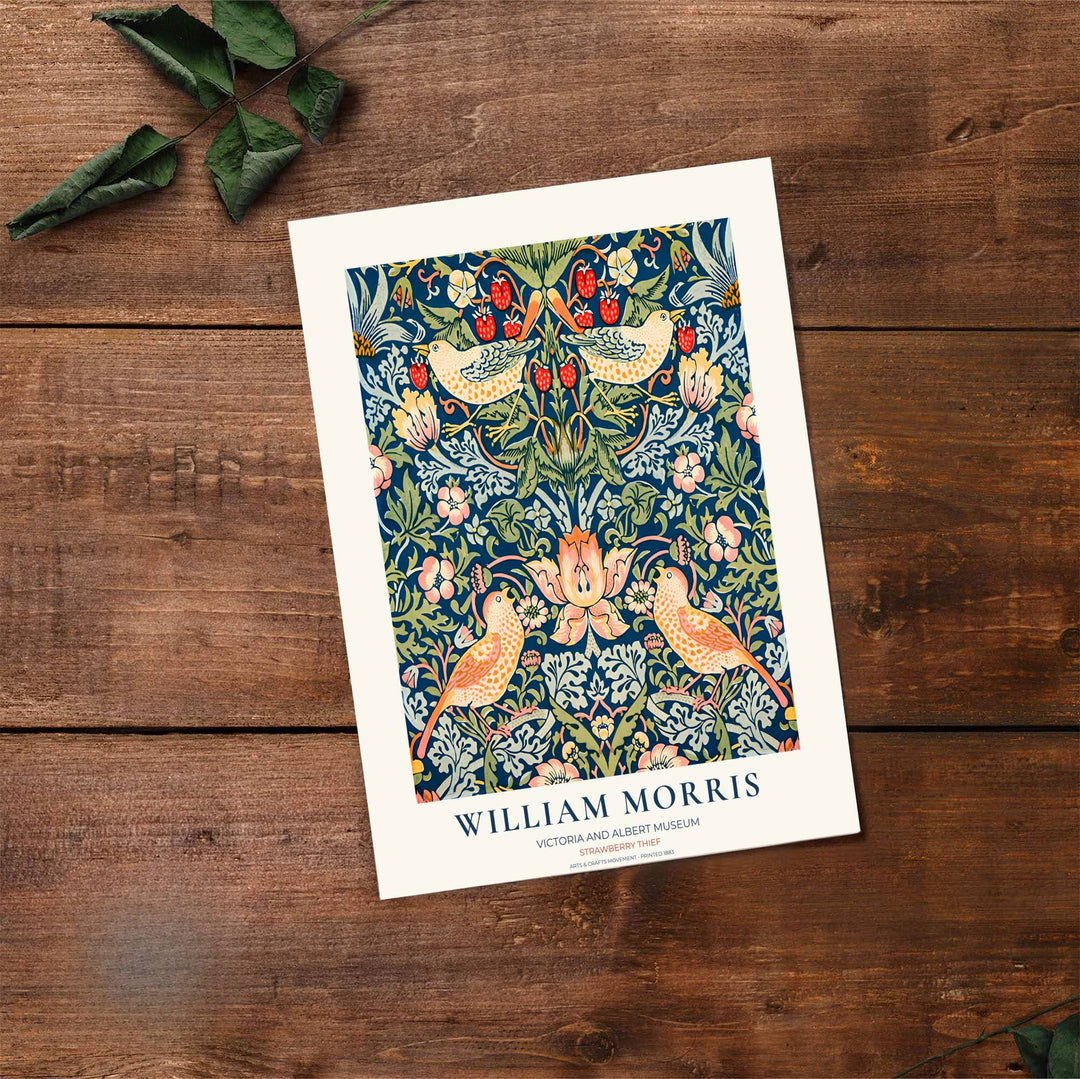 English Arts and Crafts museum layout defining this blue and red William Morris Strawberry Thief print. Order custom framed, unframed, and canvas options available at MapYourDreams to establish a charming home accent.