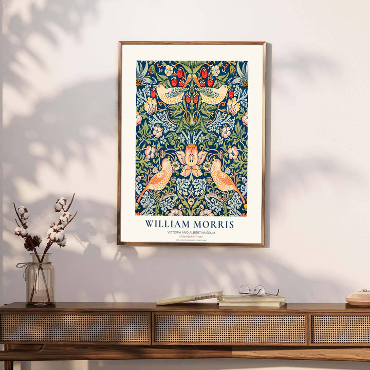 Authentic V&amp;A museum border encloses cobalt blue and red fruit graphics in a William Morris Strawberry Thief print. Pick high-contrast framed, unframed, and canvas options available at MapYourDreams for art displays.