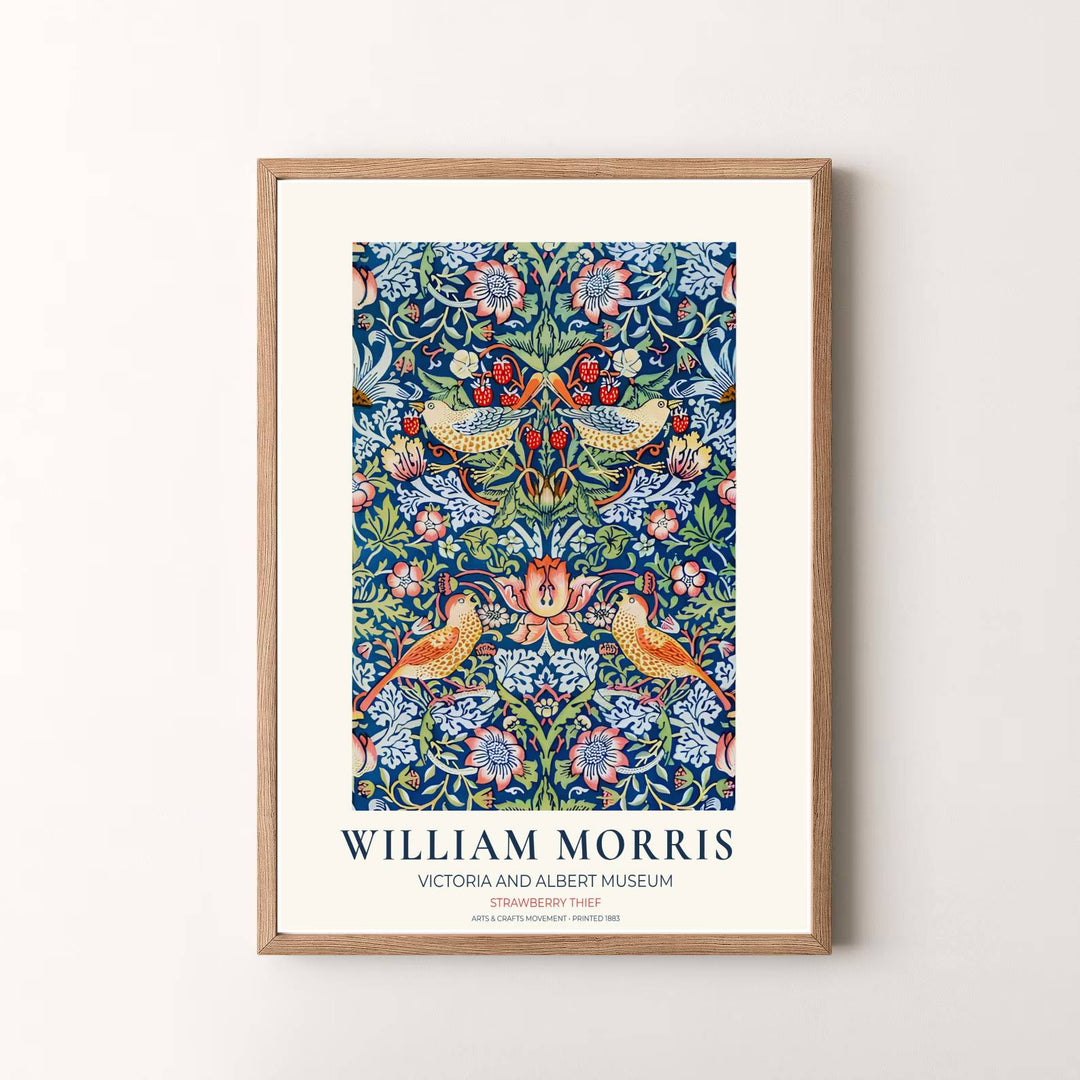 Authentic museum typography frames this indigo blue William Morris Strawberry Thief art layout. Pick high-contrast framed, unframed, and canvas options available at MapYourDreams for a refined art presentation.