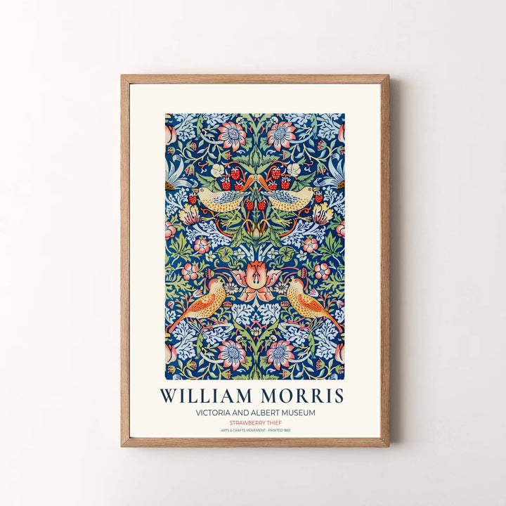 Authentic museum typography frames this indigo blue William Morris Strawberry Thief art layout. Pick high-contrast framed, unframed, and canvas options available at MapYourDreams for a refined art presentation.