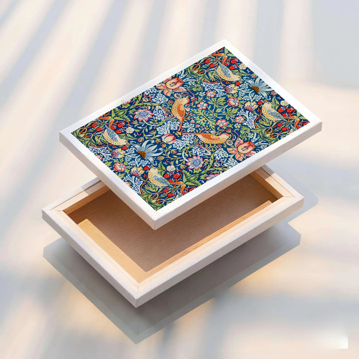 Full-bleed bird motifs and green vines create a warm aesthetic in this William Morris Strawberry Thief art print. MapYourDreams features high-resolution framed, unframed, and canvas options available for kitchen walls.