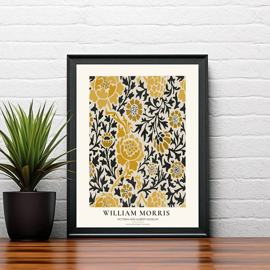 Graphic sunflower illustrations and dark foliage define this William Morris Sunflower print. MapYourDreams offers fine art framed, unframed, and canvas options available to elevate reading nook gallery wall setups.