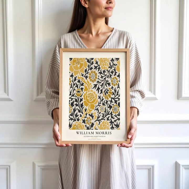 Yellow sunflower heads and dark charcoal foliage highlight the central design of this William Morris Sunflower print. Find stunning framed, unframed, and canvas options available at MapYourDreams for gallery walls.