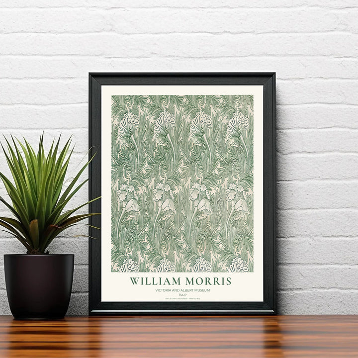 Detailed green floral linework and cream margins define this William Morris Tulip print. MapYourDreams offers fine art framed, unframed, and canvas options available to elevate reading nook gallery wall setups.