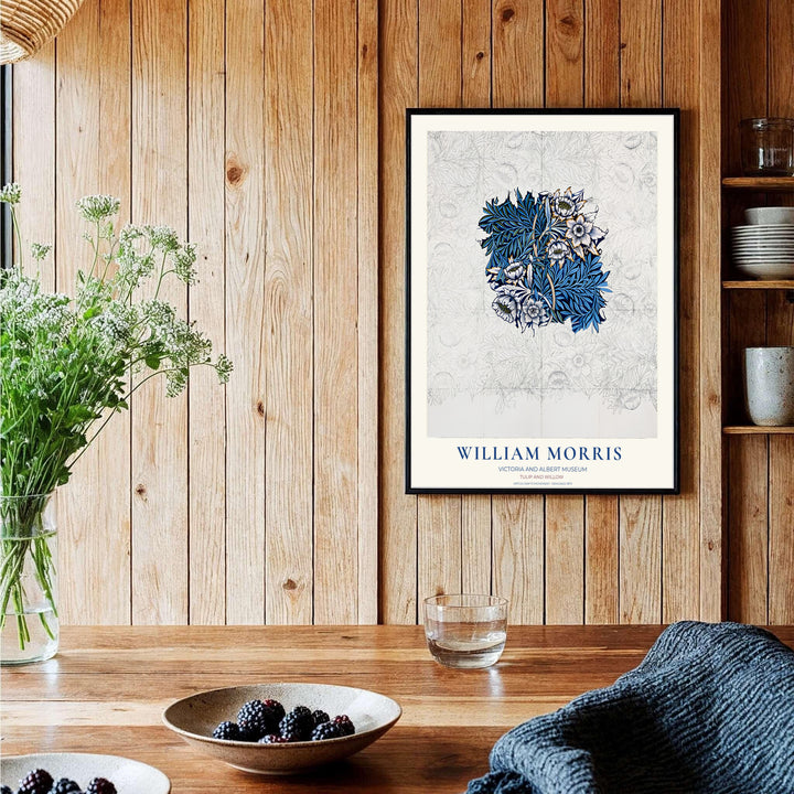 White tulips and dark blue willow leaves pop from sketch lines in this William Morris Tulip Willow Sketch art print. Discover ready-to-hang framed, unframed, and canvas options available at MapYourDreams for room decoration.