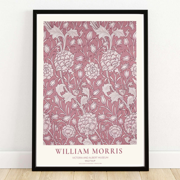 The dusty rose William Morris Wild Tulip exhibition poster showcases Victoria and Albert Museum archive art with soft cream floral linework. MapYourDreams offers custom framed, unframed, and gallery canvas options for home decor.