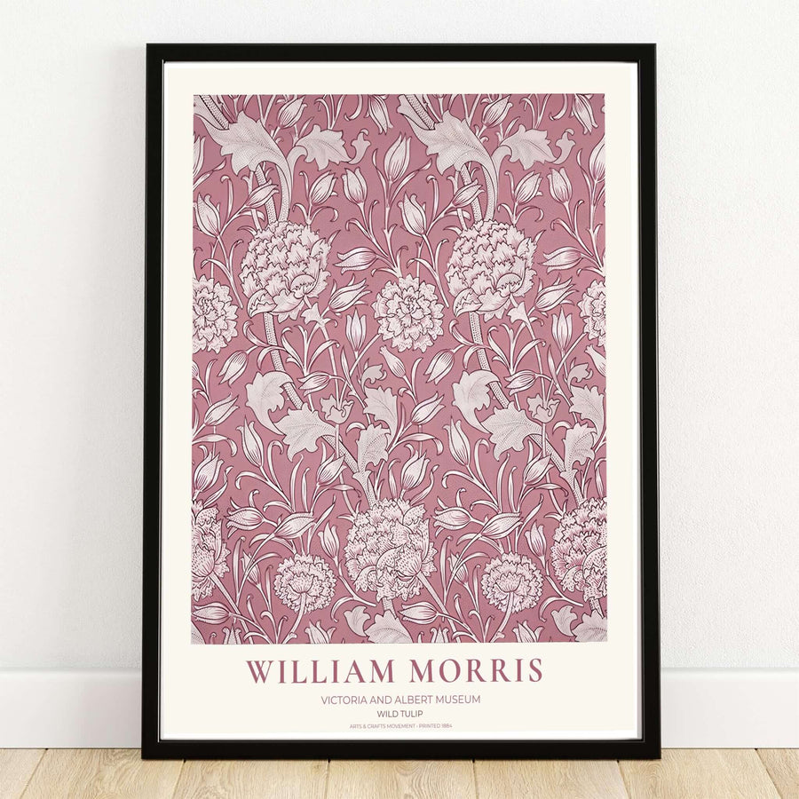 The dusty rose William Morris Wild Tulip exhibition poster showcases Victoria and Albert Museum archive art with soft cream floral linework. MapYourDreams offers custom framed, unframed, and gallery canvas options for home decor.