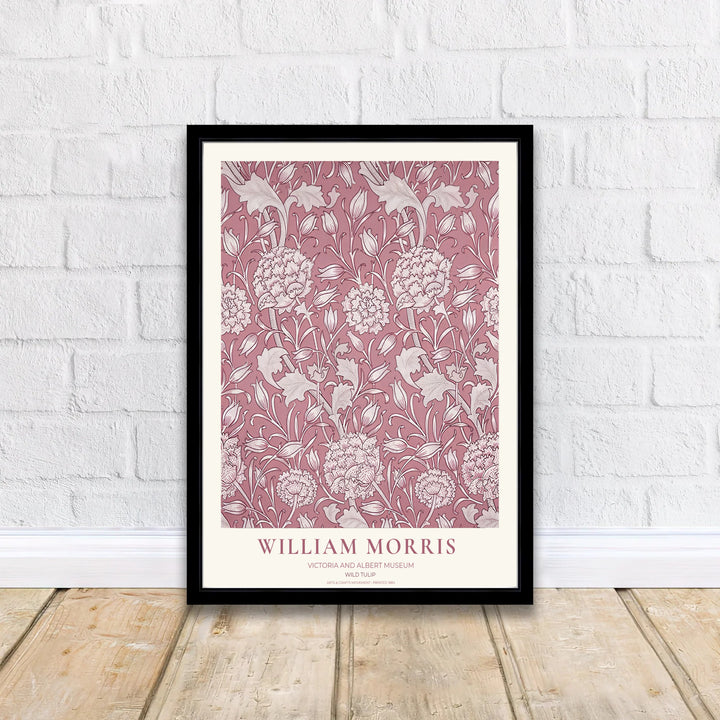 Classic Victorian typography and intricate pink tulip details mark this William Morris Wild Tulip exhibition print. MapYourDreams offers fine art framed, unframed, and gallery canvas poster options for wall decor.