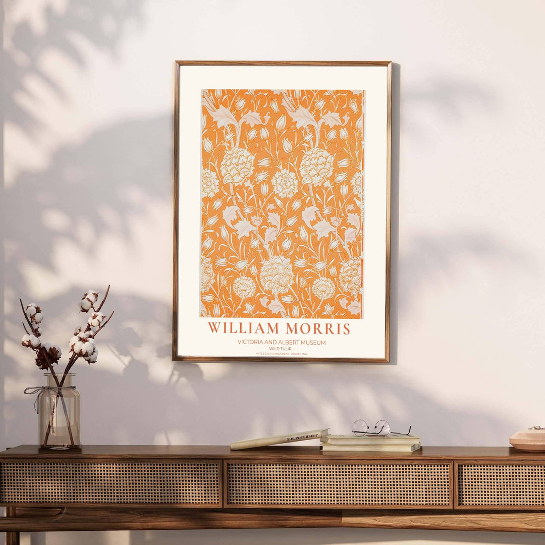 Rich terracotta orange tapestry background and delicate cream wild tulip vines define this William Morris exhibition print from the Victoria and Albert Museum. Order versatile framed, unframed, or canvas poster formats at MapYourDreams.