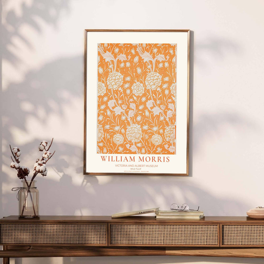 Rich terracotta orange tapestry background and delicate cream wild tulip vines define this William Morris exhibition print from the Victoria and Albert Museum. Order versatile framed, unframed, or canvas poster formats at MapYourDreams.