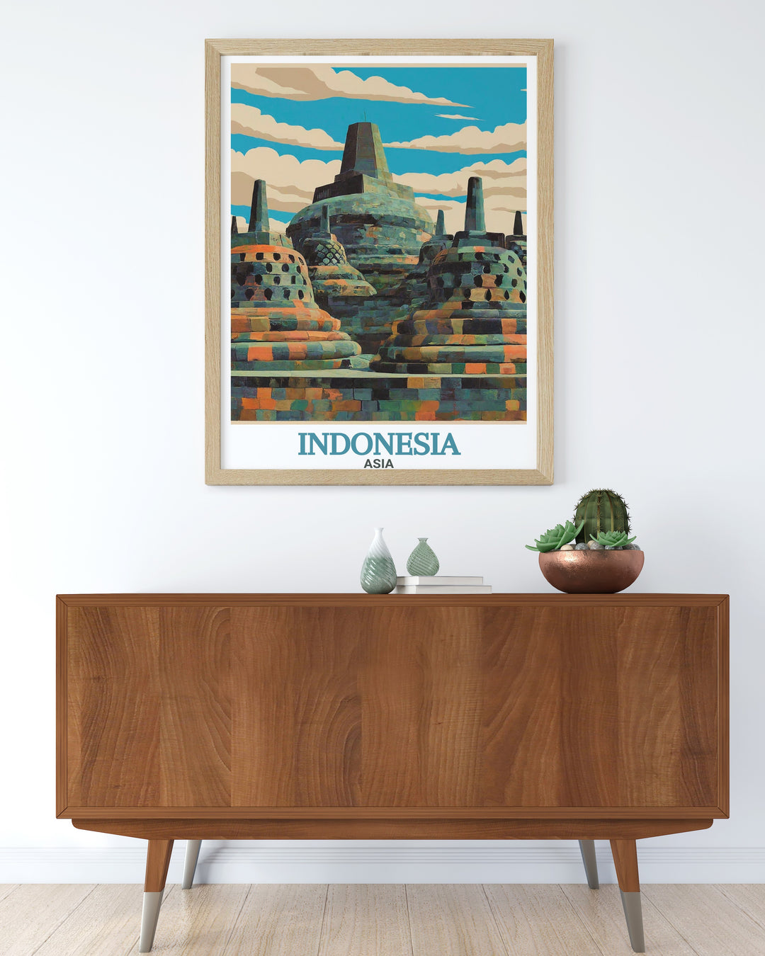 Celebrate the architectural wonder of Borobudur Temple and Balis lush landscapes with this stunning Indonesia travel print. Perfect for adding a cultural touch to any living space, this artwork highlights the best of Indonesias heritage.