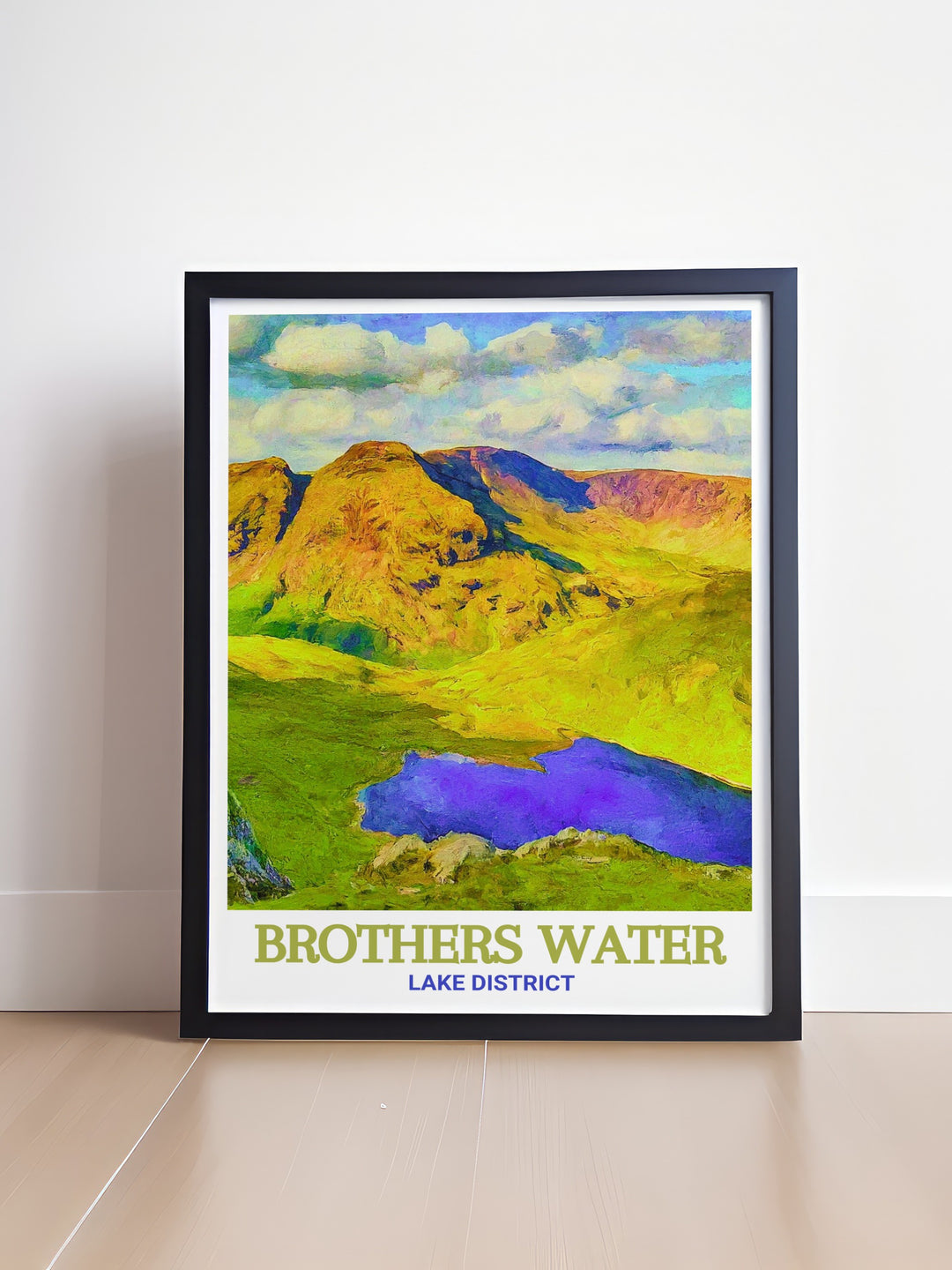 Lake District travel print showcases the serene beauty of Brothers Water, offering a calming view of the lake and its surrounding valley. This art print is a great way to celebrate Englands natural beauty in any living space.