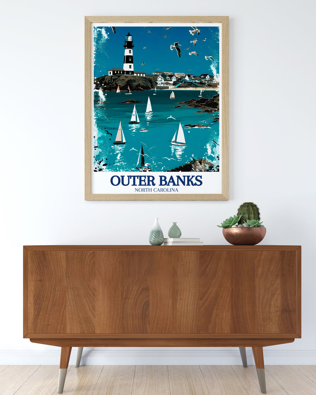 Cape Hatteras Lighthouse Wall Art featuring the striking black and white lighthouse set against the serene backdrop of the Atlantic Ocean. The detailed artwork brings the historic lighthouse to life, making it a standout piece for any coastal themed room or maritime art collection.