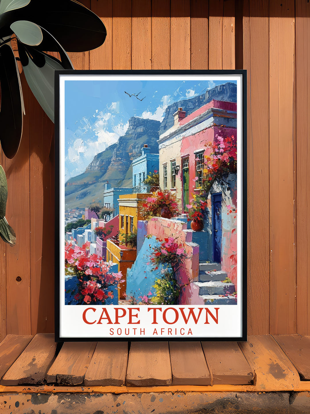 Elevate your home decor with this South Africa travel poster featuring Table Mountain and Bo Kaap. The perfect combination of natural beauty and cultural charm. A great framed print for any room needing a pop of color and a travel inspired touch.