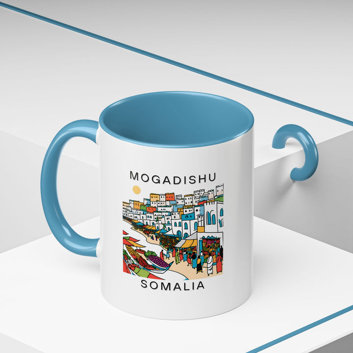 Embrace the beauty of Mogadishu with this intricately designed mug. Featuring artwork of the city’s landmarks, it’s perfect for enjoying your favorite beverages. This durable, dishwasher-safe mug is a perfect gift for fans of Somali culture.