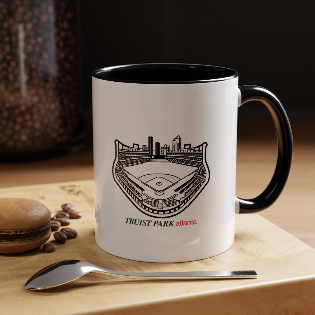 This Truist Park Atlanta Mug combines practicality with artistic design, displaying intricate artwork of Atlantas beloved stadium. Made from durable ceramic, it is dishwasher and microwave safe, adding elegance to your daily routine and coffee breaks.