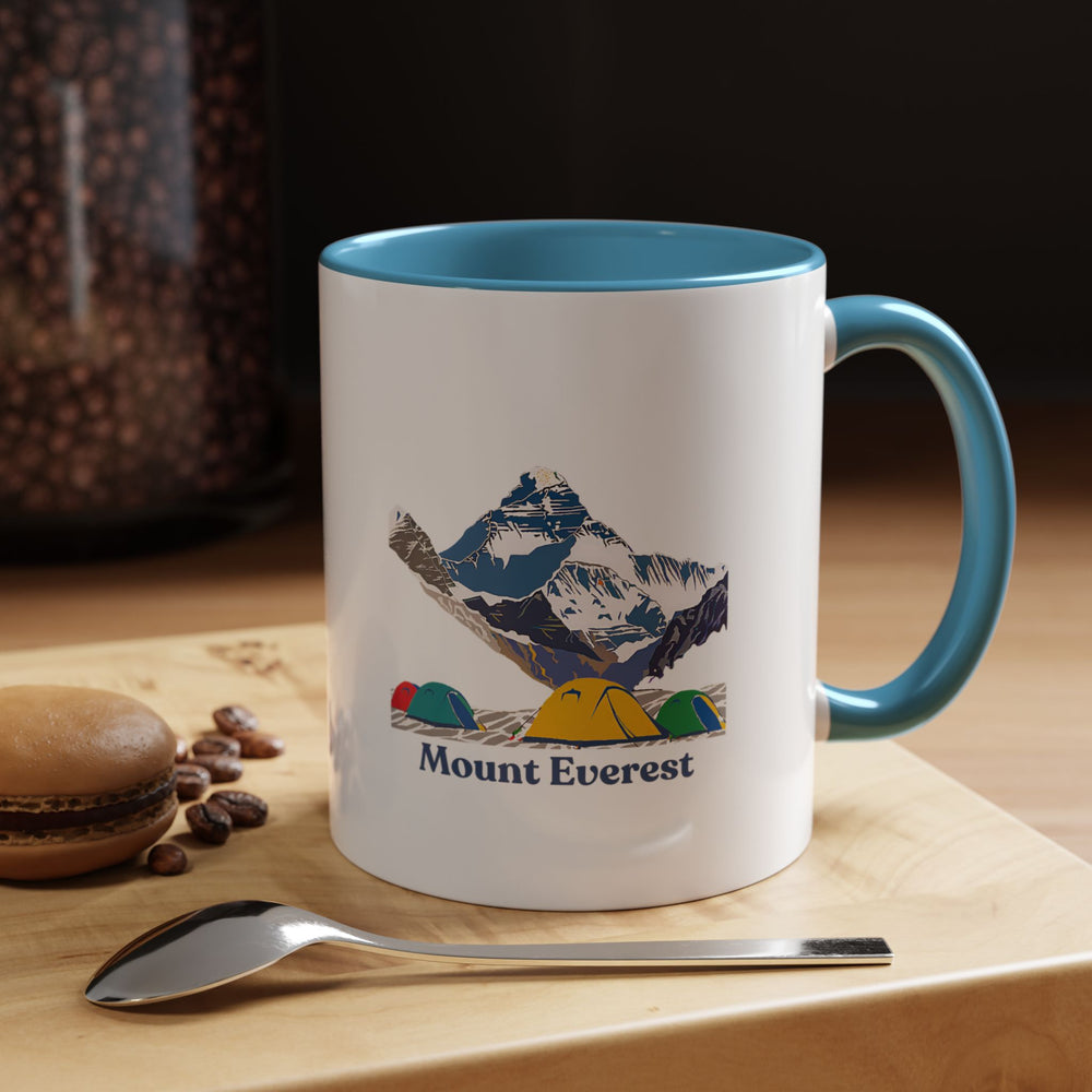 This Mount Everest mug captures the grandeur of the world’s tallest peak with intricate designs. Crafted from durable ceramic and dishwasher-safe, it is ideal for coffee or tea lovers and makes a meaningful gift for fans of Mount Everest’s iconic beauty.