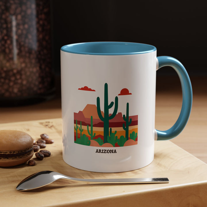 A durable Arizona Mug showcasing bold colors inspired by Arizona's landscapes and culture. Perfect for coffee lovers and art fans, this dishwasher-safe ceramic mug offers both style and convenience for everyday use.