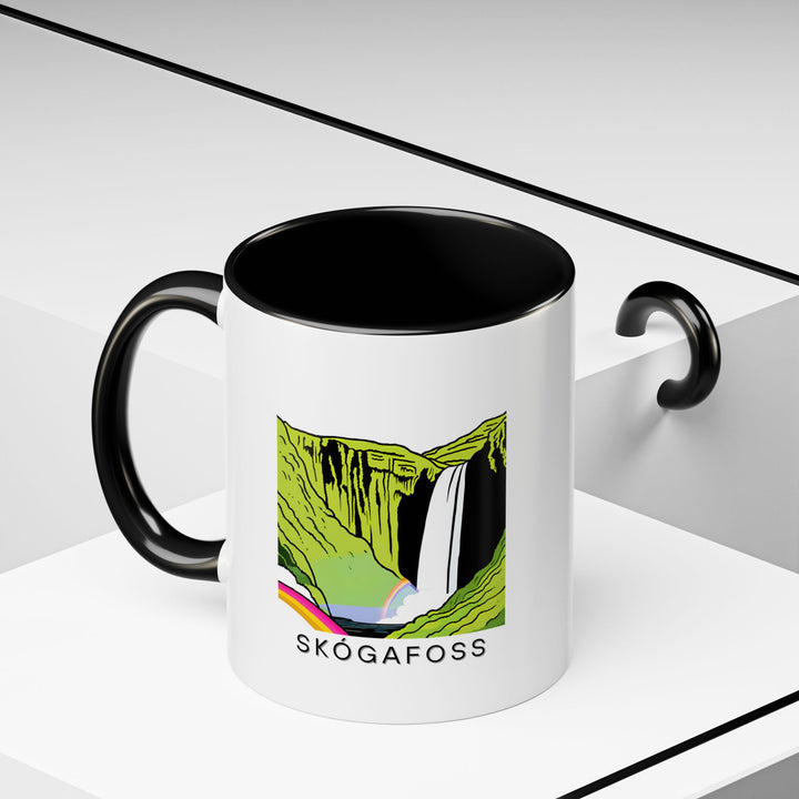 This Skógafoss Iceland mug is a must-have for nature lovers and Iceland enthusiasts. Featuring stunning artwork of the famous waterfall, it is perfect for hot beverages and makes a meaningful gift. Dishwasher and microwave safe for your convenience.