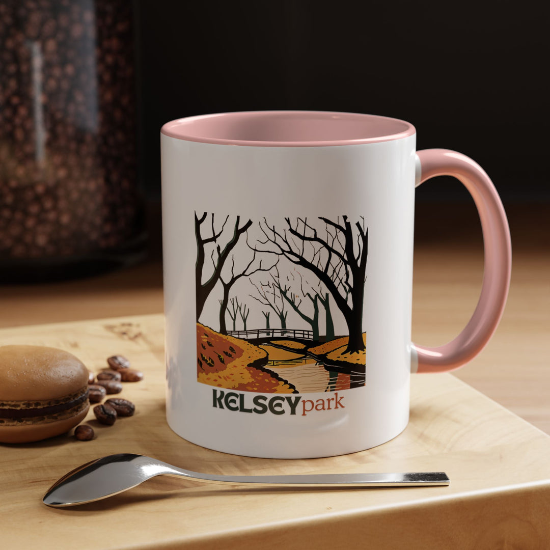 Celebrate the tranquility of Kelsey Park with this durable ceramic mug. Perfect for tea or coffee, its vibrant design makes it a lovely keepsake or gift for nature lovers and park admirers.