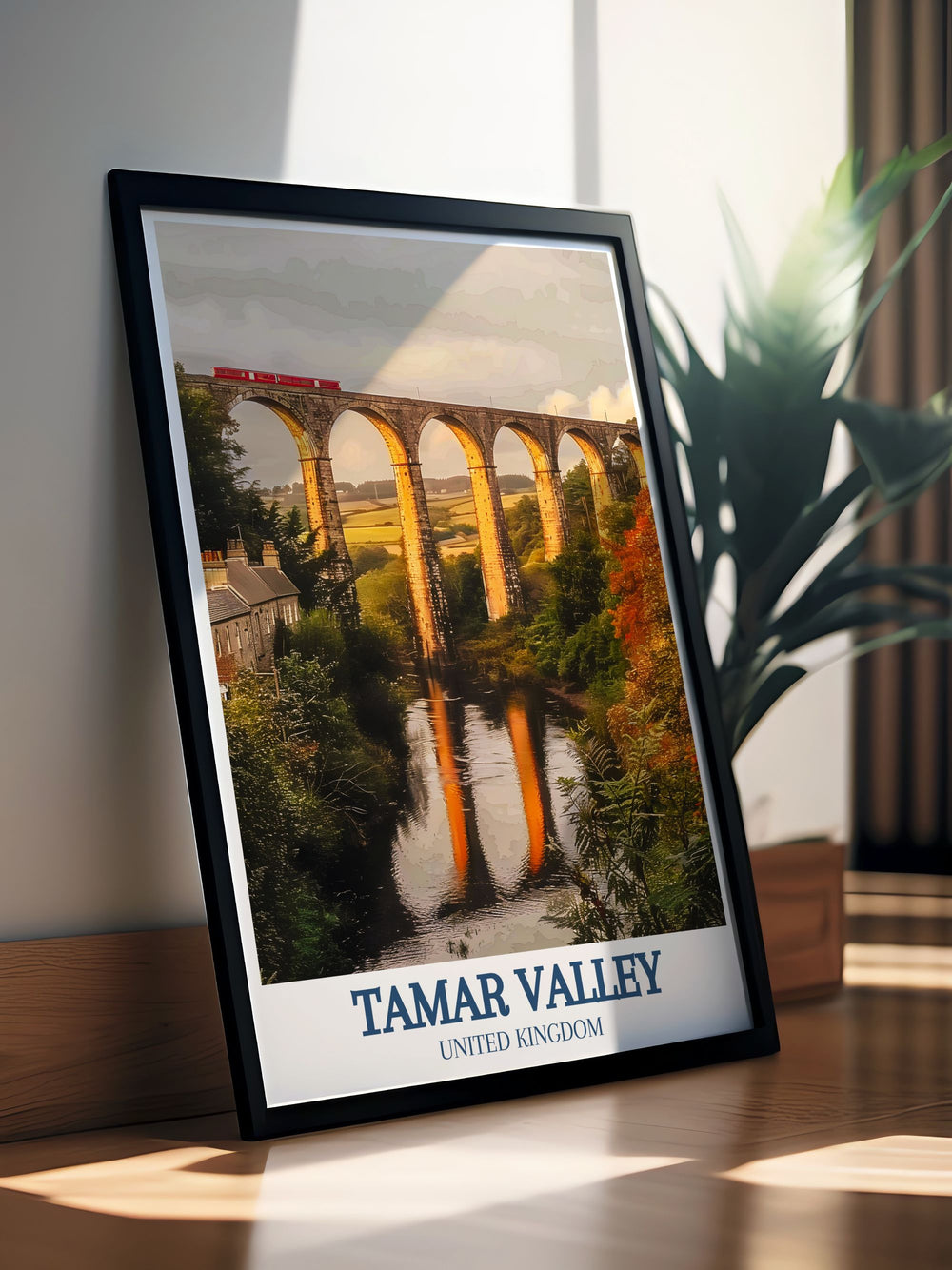 Enhance your living room with the elegant home décor of Calstock Viaduct and Morwell Rocks. This framed print captures the vibrant colors and intricate details of Cornwall and Devons iconic landscape, making it a captivating addition to your wall art collection.