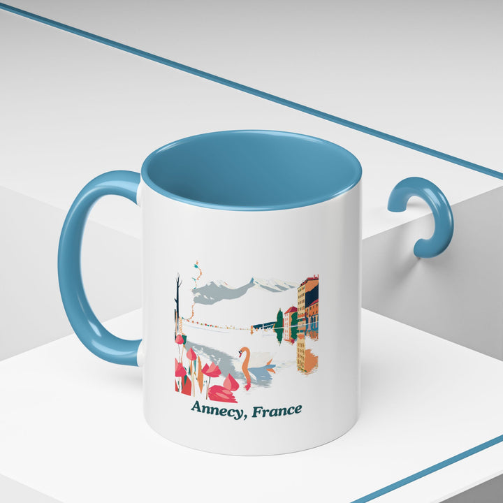 Add a touch of Annecy’s charm to your day with this beautifully designed mug. Featuring intricate artwork and crafted from durable ceramic, it is dishwasher-safe and perfect for gifting or collecting.