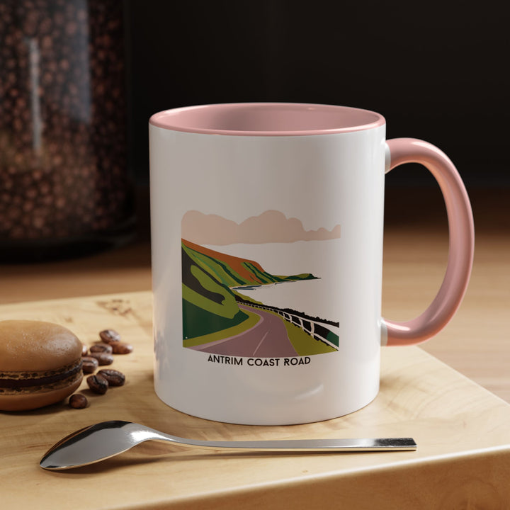 A ceramic Antrim Coast Road mug designed with detailed artwork inspired by Ireland’s rugged coastlines. Dishwasher and microwave safe, it is perfect for daily use, making it a practical and artistic gift for travelers and coffee lovers alike.