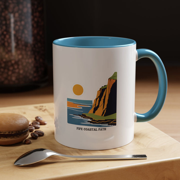 Elegant ceramic Fife Coastal Path mug featuring detailed artwork of Scotland’s famous trail. Perfect for coffee or tea lovers, it blends practicality with artistic charm. A meaningful gift for travelers and outdoor enthusiasts.