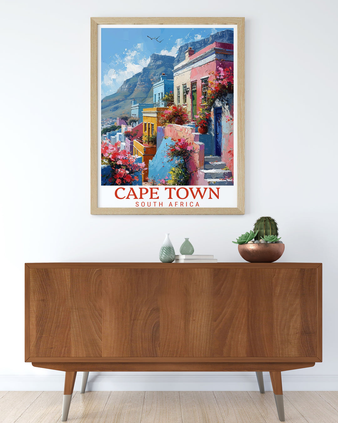 Stunning Table Mountain print with bold colors of the Bo Kaap district. This National Park artwork brings the vibrancy of Cape Town into any space and serves as a reminder of adventure and exploration. Ideal for living room decor and travel enthusiasts.