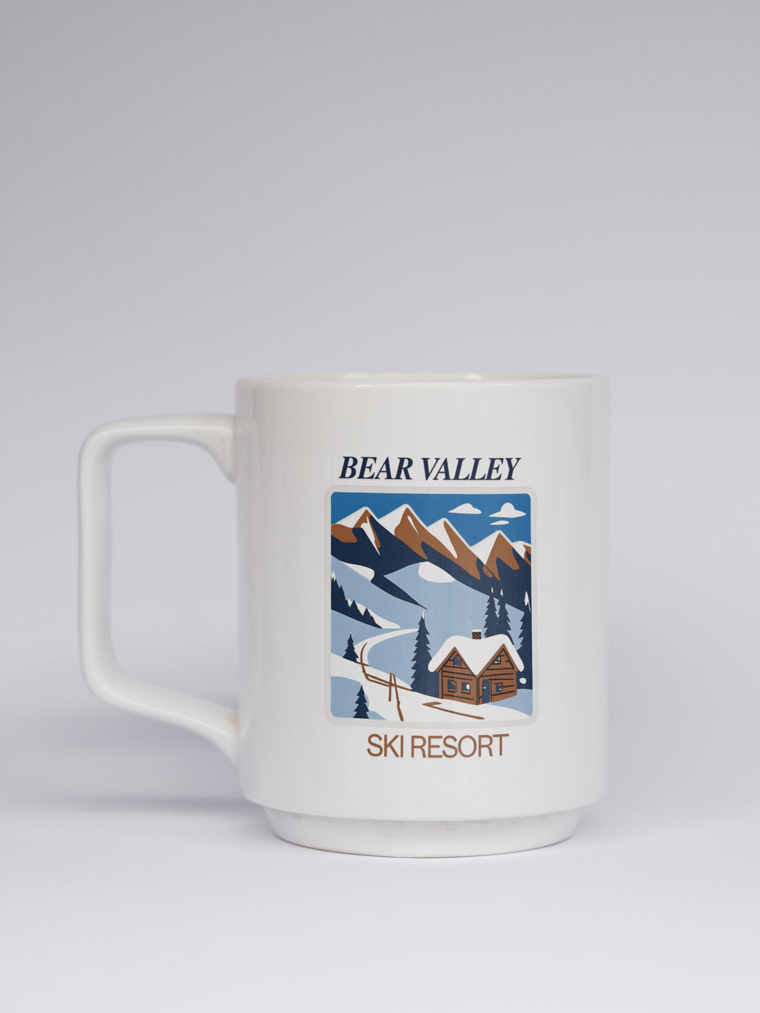 Add a touch of Bear Valley to your day with this elegantly designed mockup for a mug. Made from durable ceramic and dishwasher-safe, it features intricate artwork that makes it an excellent gift or collector’s item.