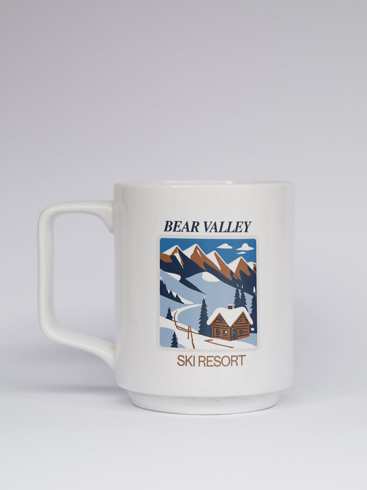 Add a touch of Bear Valley to your day with this elegantly designed mockup for a mug. Made from durable ceramic and dishwasher-safe, it features intricate artwork that makes it an excellent gift or collector’s item.