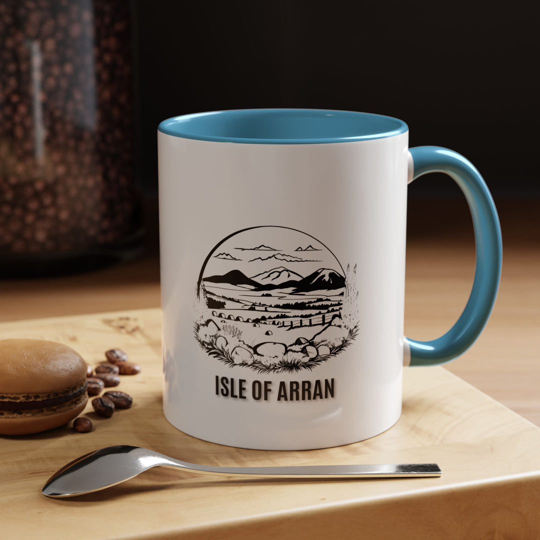 This Isle of Arran ceramic mug showcases stunning artwork inspired by Scotland's scenic island. With a stylish design, it is dishwasher-safe and an excellent keepsake for tea and coffee lovers.