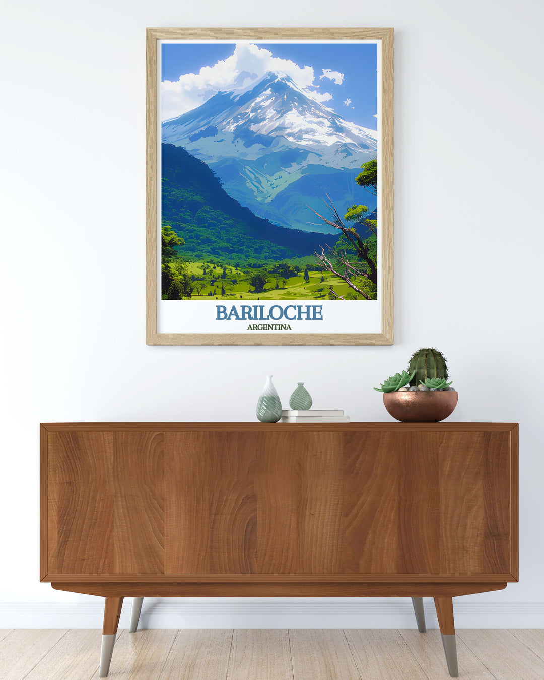 Vibrant art print of San Carlos de Bariloche, highlighting the blend of historic architecture and natural landscapes with Tronador Volcano in the background. Ideal for those who love historic towns and want to add a touch of Argentinas charm.