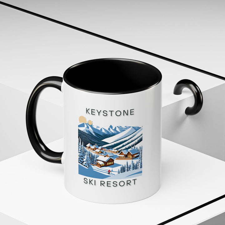 Enjoy the beauty of Keystone Ski Resort every day with this ceramic mug featuring stunning designs inspired by Colorado’s mountain charm. Dishwasher-safe and practical, it is perfect for coffee or tea lovers and makes a meaningful gift.