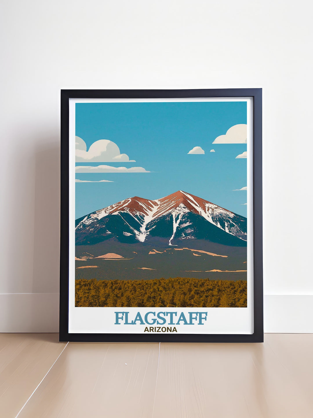 Flagstaff Arizona poster print highlights the natural beauty of Arizonas high desert, with the towering San Francisco Peaks standing proudly in the background. This travel print brings the majesty of Arizonas mountain ranges into your home, perfect for nature and adventure lovers.