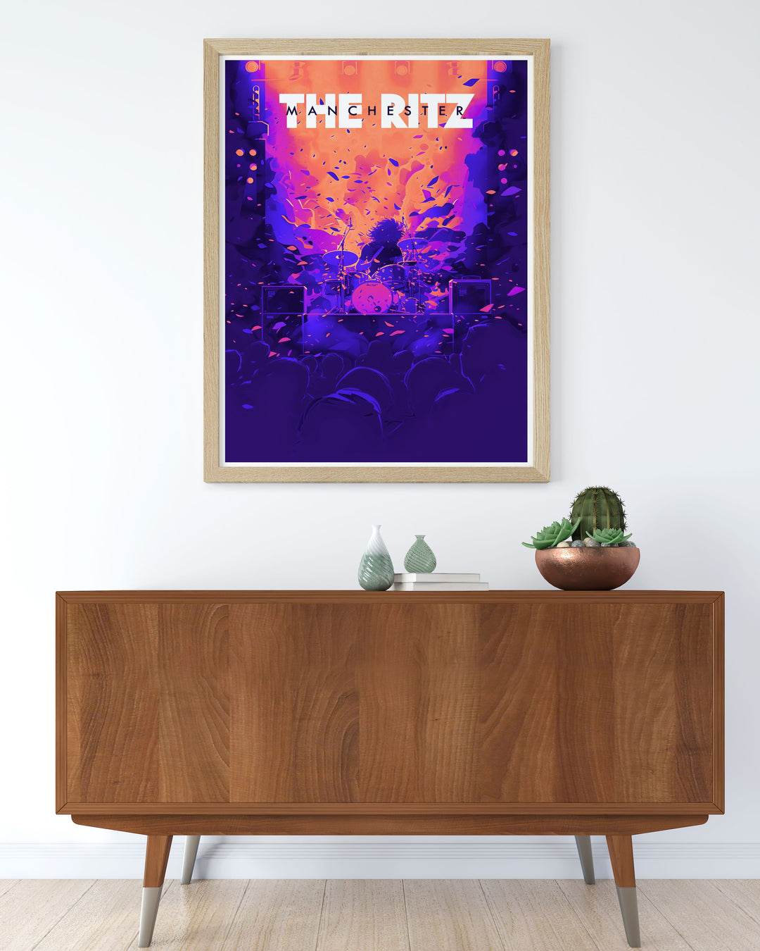 This travel poster of The Ritz Manchester highlights its stage and performance area in a classic art deco style. Perfect for fans of Manchesters music history, this print offers a unique way to celebrate one of the citys most famous venues.