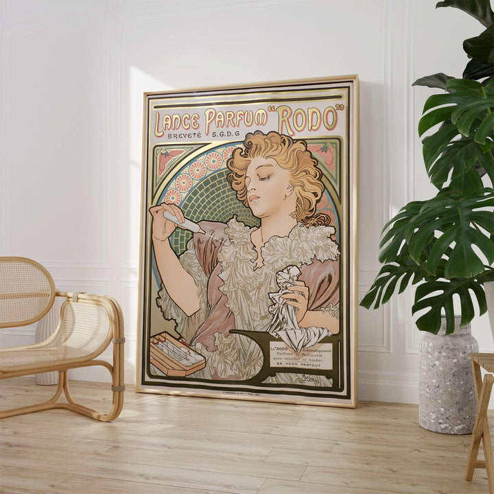 Alphonse Mucha Lance Parfum Rodo 1896 French print of perfume advertising by artist Alphonse Mucha displaying a lady spraying fragrance in Paris France. MapYourDreams offers framed, unframed paper, and canvas wall art options.
