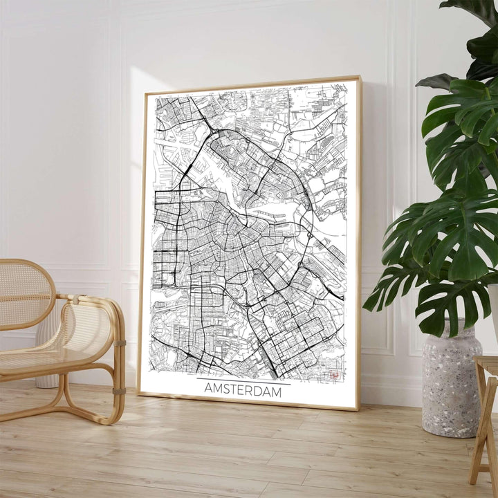 High-contrast cartography print of an Amsterdam street map detailing the intricate city grid and waterways, offered by MapYourDreams where you can choose between an unframed archival paper poster, museum stretched canvas, or custom frame finishes to elevate your home office or study wall.