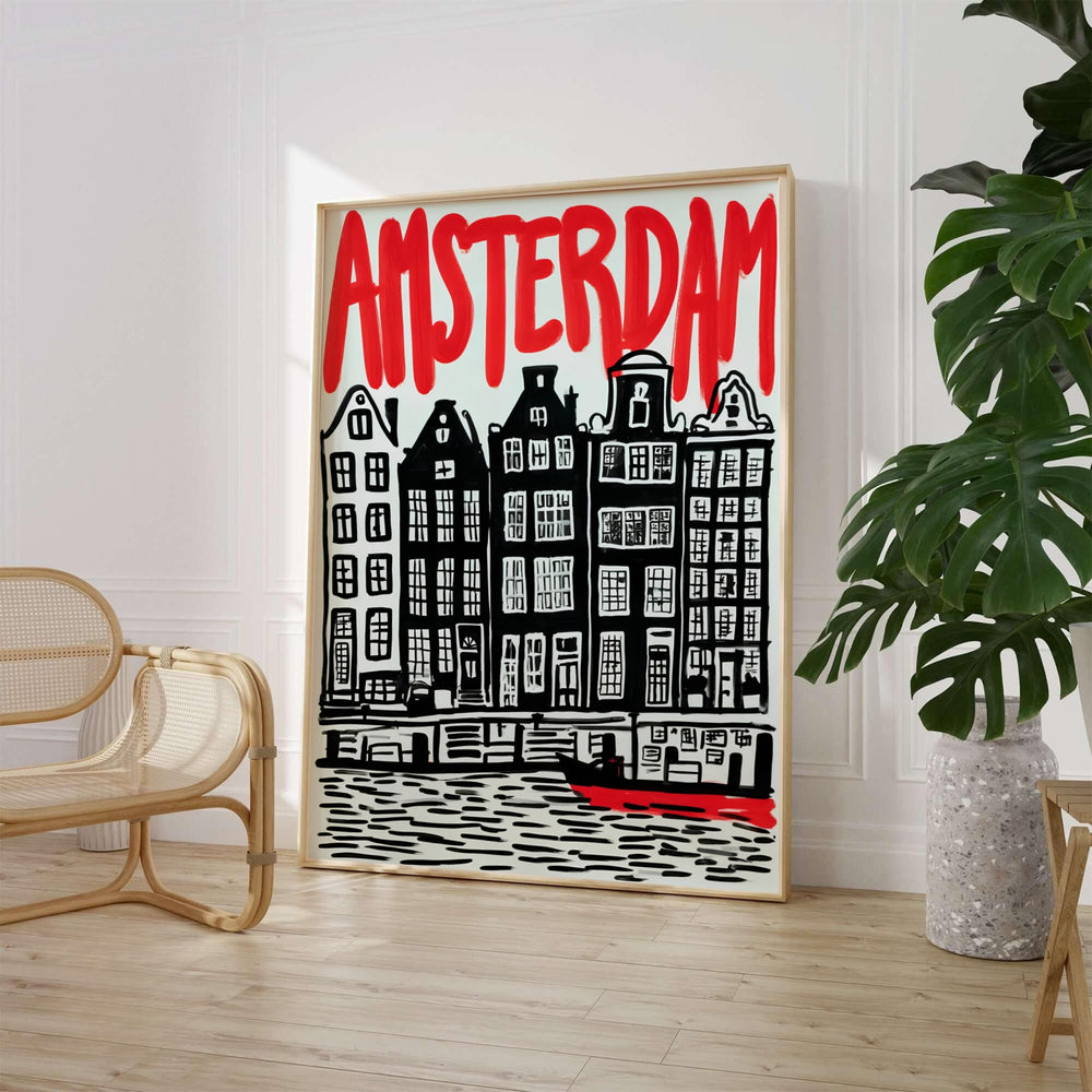 Graphic linocut art print of carved gabled canal houses in black ink with red typography of Amsterdam Netherlands, available from MapYourDreams where you can choose between an unframed fine art poster, museum stretched canvas, or custom frame finishes for eclectic bedroom styling.